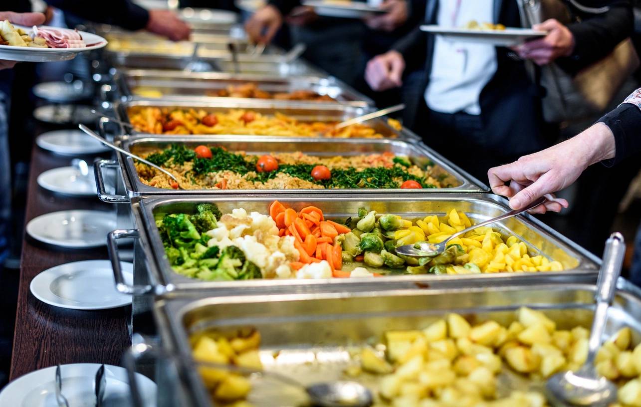 Happy customer enjoying a catered meal